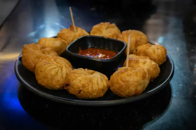 a plate of food with sauce on it